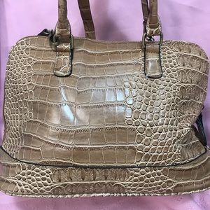 Tan Purse only used once in great condition.